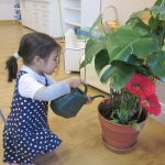 kid_watering_plants