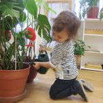 kid_watering_plant